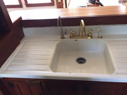 Freshly cleaned sink in old farm house.