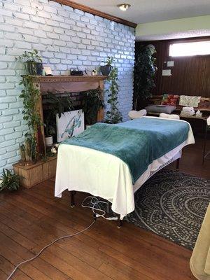 Setting for couples massage in main room.