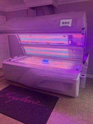 Hybrid tanning bed. Both UV and red light therapy in a 10 min session