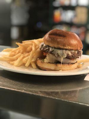 Burger with cheddar cheese, lettuce, tomato and truffle aioli