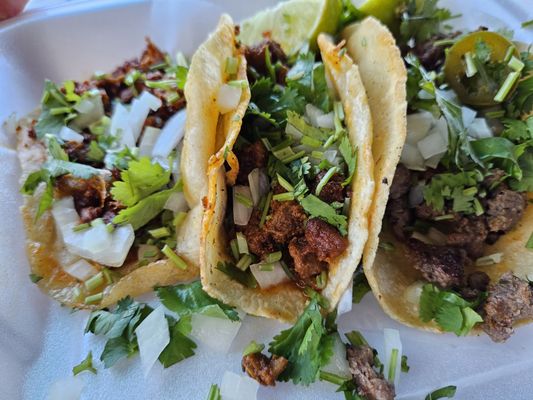 Pastor pork and asada steak tacos