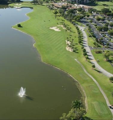 The closing hole, number 18!  It's a par 5 with your approach shot over water to a well protected green, a great finishing hole.