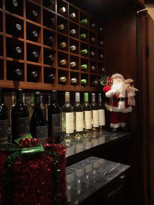 Some of our tasting room wines decorated for the holidays!