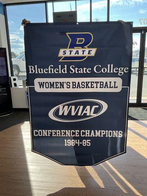 Championing excellence!  FASTSIGNS, presents a new pennant for Bluefield State College, celebrating the 84-85 WVIAC Basketball Champions.