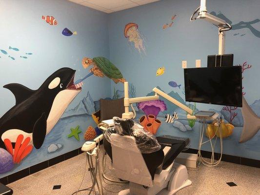 Our special room for kids is beautifully painted with fun cartoons to set kids at ease and help them enjoy getting checkups.