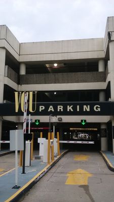 Downtown VCU parking deck steel door removal and block repair and painting