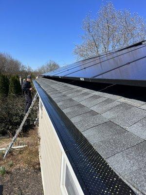 Gutter leaf guard and solar panels