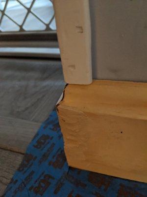 baseboard damaged - tried to fill with wood putty