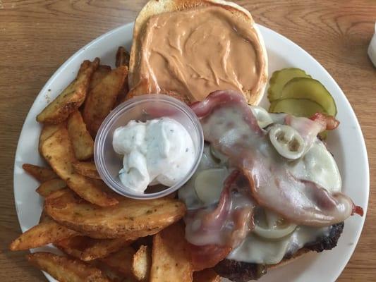 The Stiky Burger with bacon, peanut butter, provolone cheese and added jalapeño peppers and awesome sour cream potato wedges