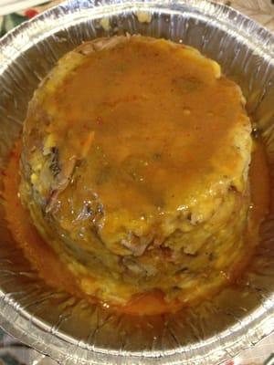 Mofongo with sauce.