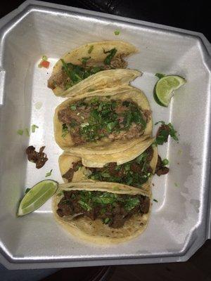 Tacos de carnitas y de fajita