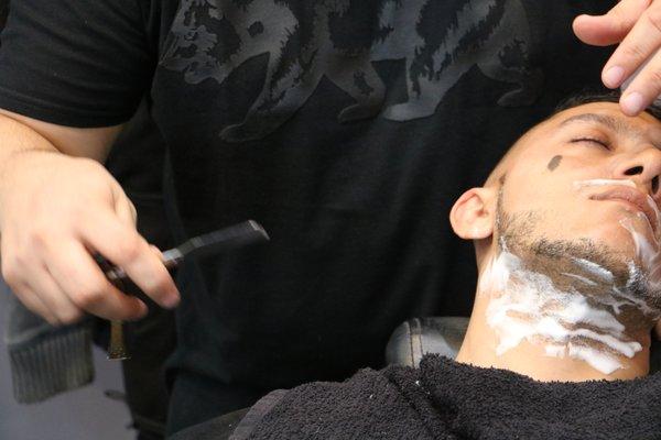 Razor Shave with hot towel.