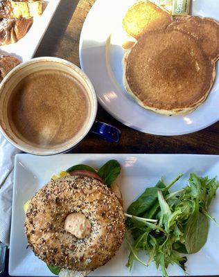 Coffee Co Jammy Sammy, extra order of buttermilk pancakes and a hot Dirty Chai Latte with oat milk.