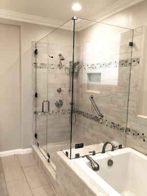 Custom designed Frameless shower enclosure, made with 3/8" clear glass