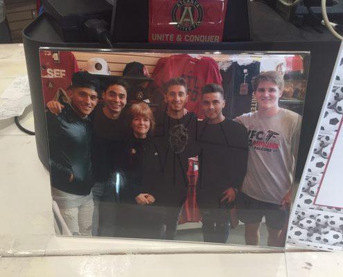 Store employees with some of the Atlanta United players