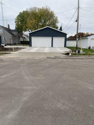 New garage, driveway, and approach