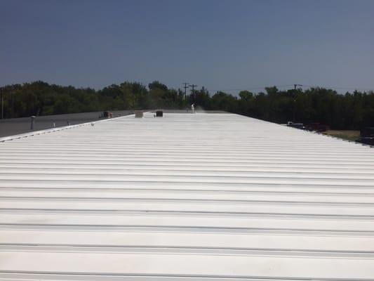 .32 mil White acrylic roof coating with 10 year warranty