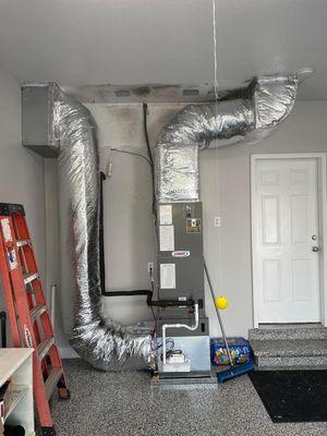 Unit in garage that we replaced and rerouted duct