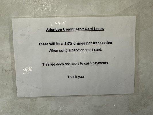 3.5% credit card fee sign.