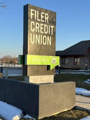 Sunny exterior photo of the Filer Credit Union sign