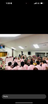 Set up of funeral and a look inside of the casket