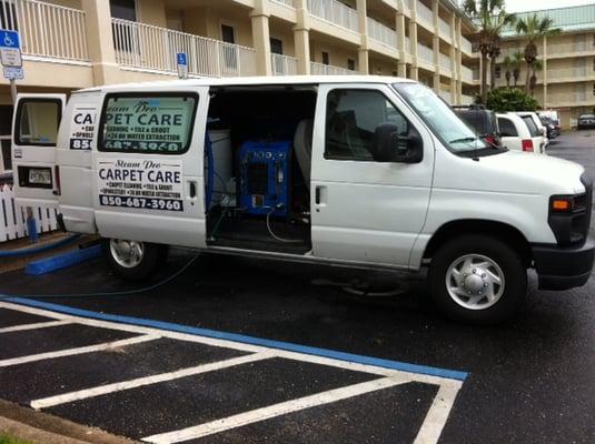 Steam Pro Carpet Care van at work.