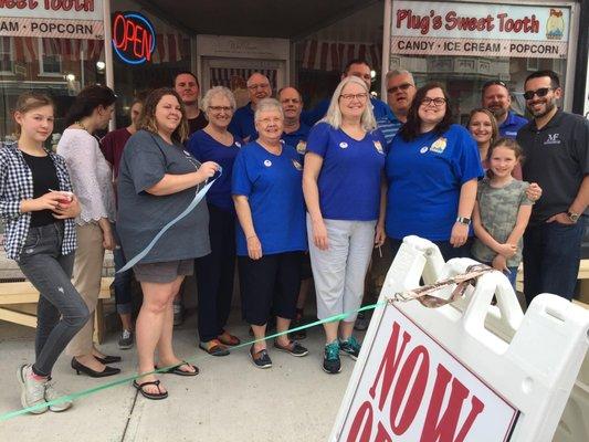 Our grand opening ribbon cutting. The Plug's staff and family and some local dignitaries.