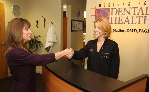 Our dental assistant April greeting a patient.