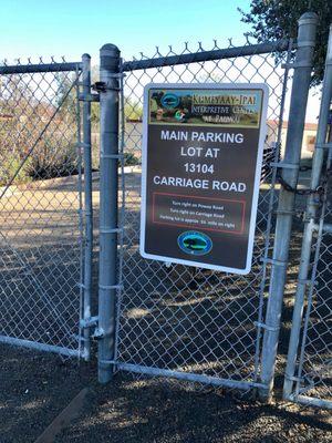 Outside signage directing you to the main parking lot on Carriage Road