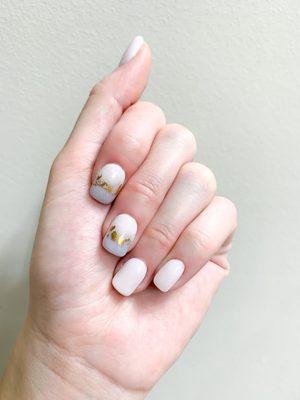 SNS manicure with ombré and gold foil accents