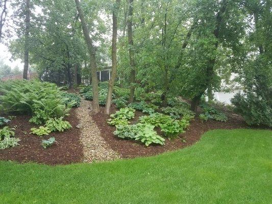 Fresh mulch can help keep weeds out of the flower beds.