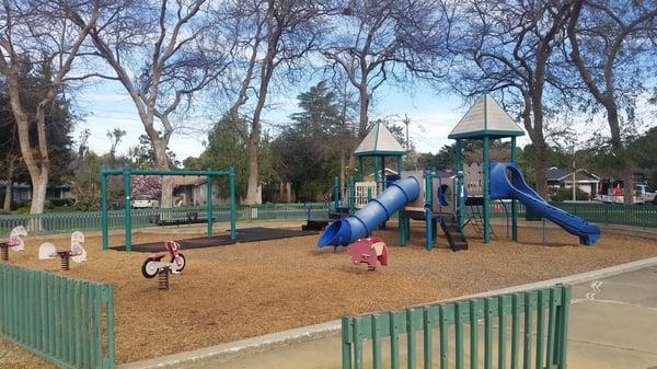 Toddler and big kids structures. Not fully gated. No bathrooms. Nice picnic area.