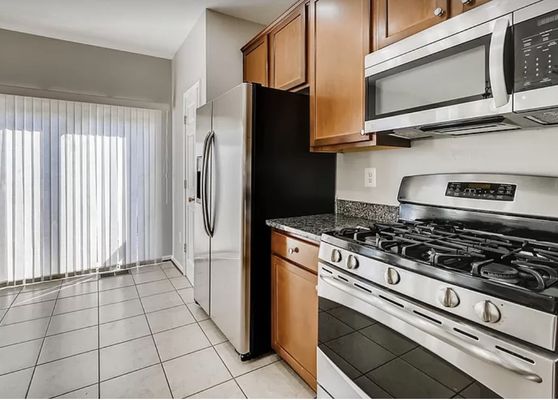 A deep clean was completed of the stove microwave, fridge, and kitchen cabinets.