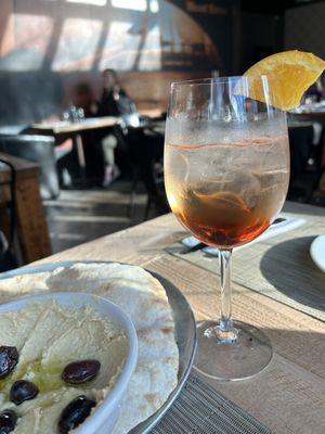 Aperol spritz and humus