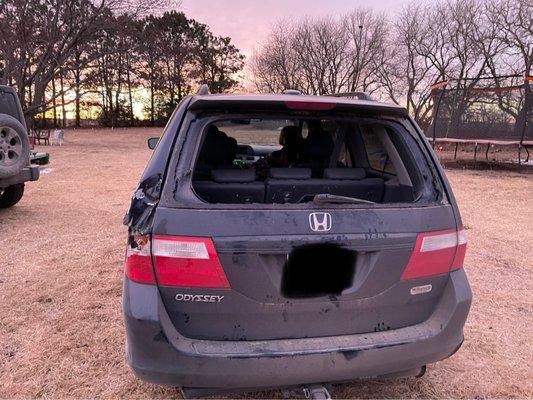 Busted back window