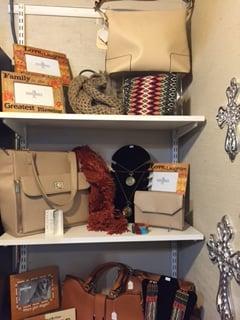 Come by and check out our fall line of handbags and scarves!!