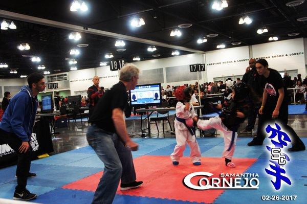 Samantha Cornejo in Black and Red Shirt with Elite White Pants