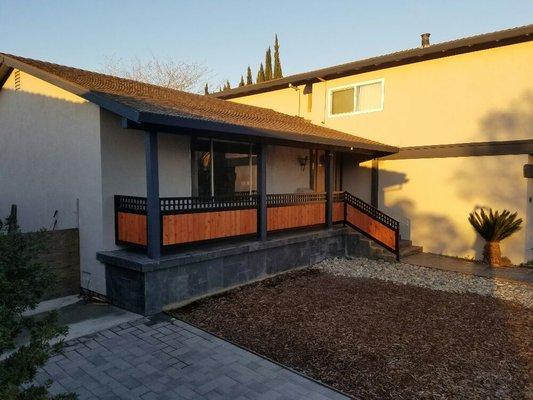 We built the handrail alone this porch and stairs. Steel frame with tongue and groove stained redwood inserts.