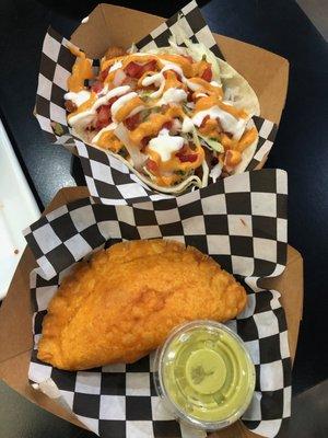 Fish taco and empanada