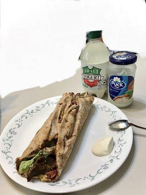 Beef shawarma, Soda Yogurt, and Puck Cream cheese spread. All from Aladdin's