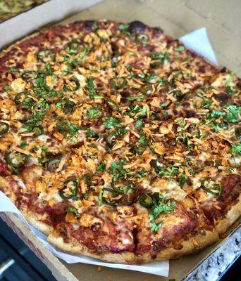 Interesting take on Banh Bahn Mi Pizza - spicy!