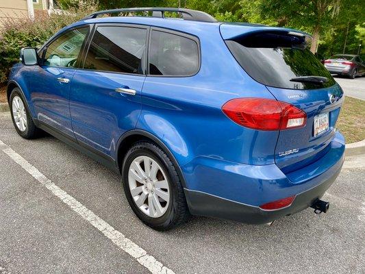 Full paint correction on a beautiful blue Suburu Tribeca