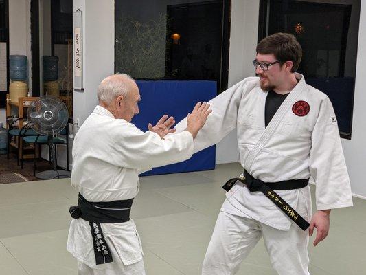 Roy Goldberg Sensei performing Daito Ryu Aiki Jujutsu technique with uke Charlie Siegel