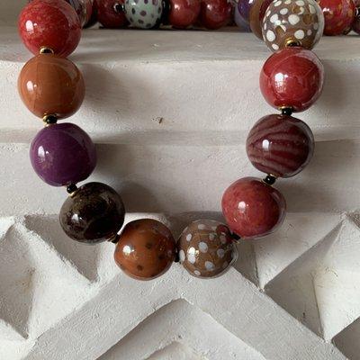 Kazuri beads from a Woman's Cooperative in Kenya. There are necklaces, bracelets and earrings.