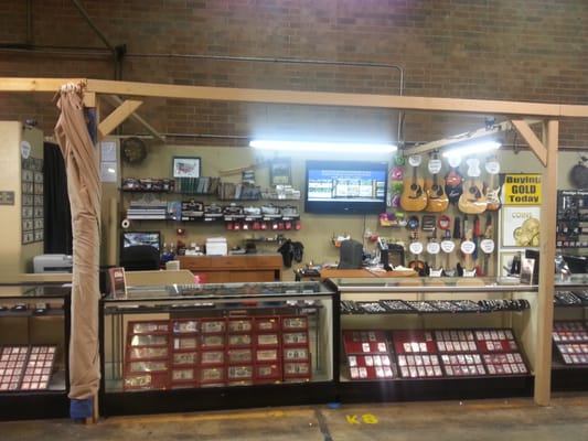 Front view of Currency and notes along with some coins and sterling, Gold jewelry. In the back you have Coin Supplies.