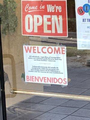 Signage welcoming all to the library