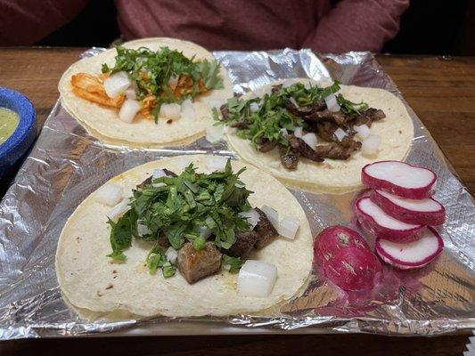 Mexican style street tacos - grilled chicken, beef tongue and carne asada steak