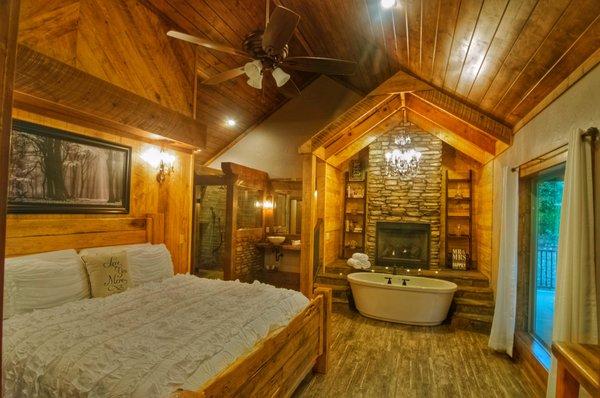 Rustic Romance King Bedroom with Thermal Air Tub and Fireplace.