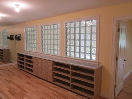 These built-in shelves were designed and installed in a master bedroom suite area to allow for additional storage.