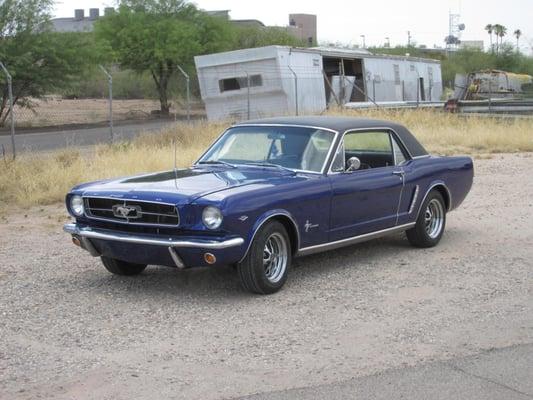 This is  a beautiful 1965 Mustang coupe with a 289 2 bbl, 4 speed, air conditioning, power steering, power disc brakes, custo...